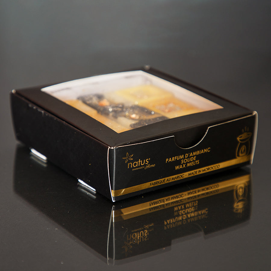 Solid room fragrance with gold leaf